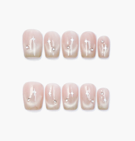 Stellar Blush Press-On Nails – Nude Base with Cat Eye Gradient and Star-Shaped Gems Accents, short Coffin Full-Cover Set