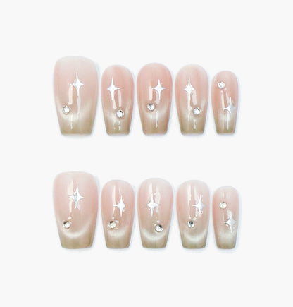 Stellar Blush Press-On Nails – Nude Base with Cat Eye Gradient and Star-Shaped Gems Accents, Medium Coffin Full-Cover Set