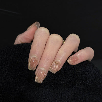 Peachy Cat Eye Press-On Nails – Pink & Gold Glitter with 3D Peach Design, Worn on Hand