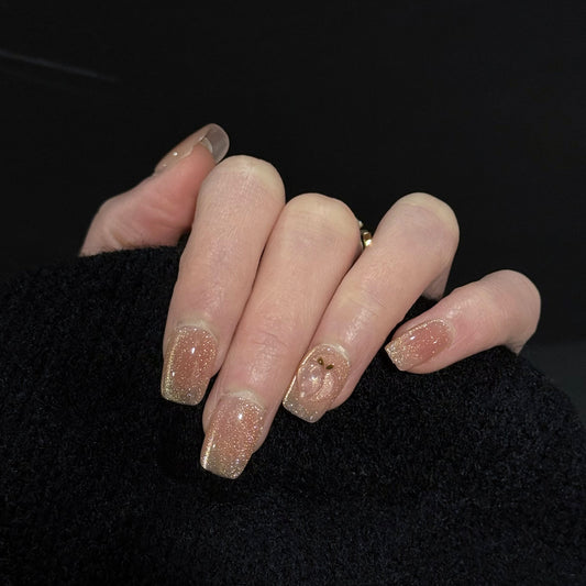 Peachy Cat Eye Press-On Nails – Pink & Gold Glitter with 3D Peach Design, Worn on Hand