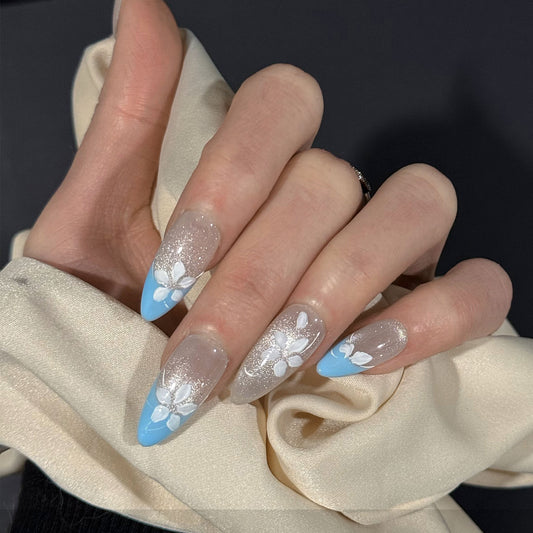 Frosted Blossom French Tip Cat Eye Press-On Nails – Soft Gradient Almond Base, Worn on Hand