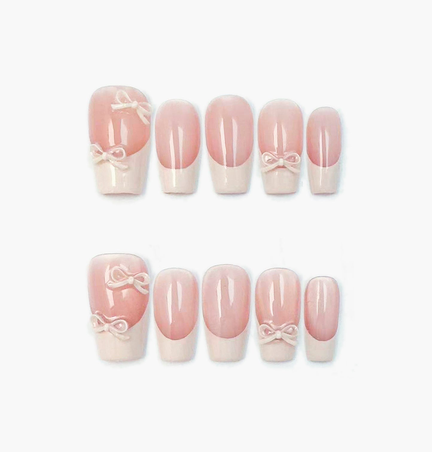 Ballerina Press-On Nails – Nude Base French Tip with 3D White Bow Charms, medium Coffin Full-Cover Set