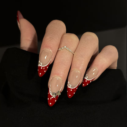 Mary Jane French Tip Gems Press-On Nails – Nude Almond Base, Worn on Hand