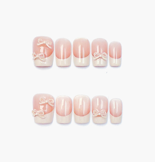 Ballerina Press-On Nails – Nude Base Cat Eye with French Tip and 3D White Bow Charms, Short Coffin Full-Cover Set