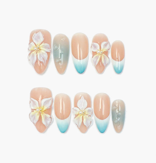 Tropical Paradise Press-On Nails – Nude & Light Blue Gradient Cat Eye with 3D Flower Charms, Medium Almond Full-Cover Set