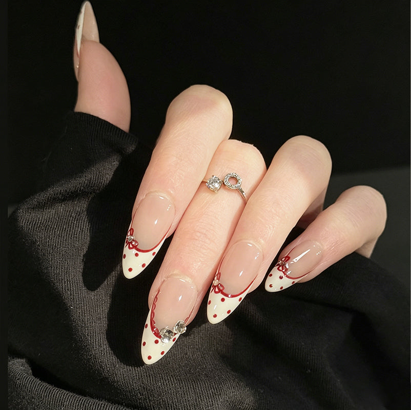 Judy French Tip Gems Press-On Nails – Nude Almond Base, Worn on Hand