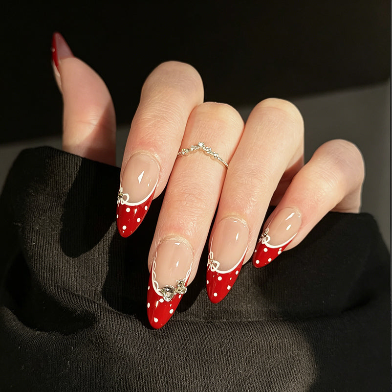 Mary Jane French Tip Gems Press-On Nails – Nude Almond Base, Worn on Hand