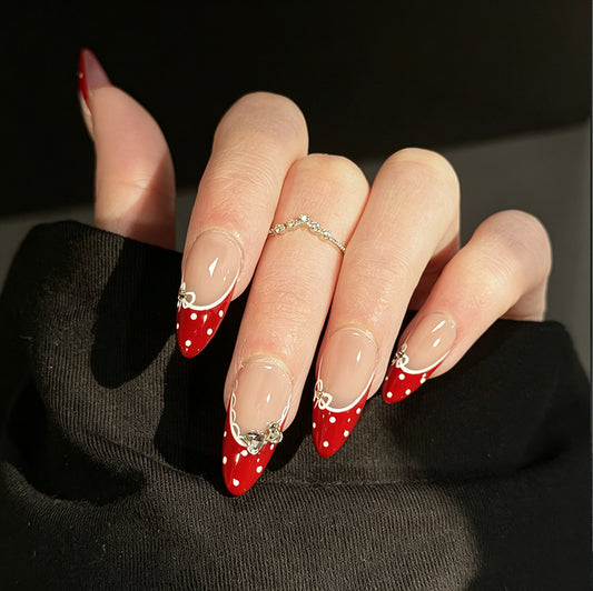 Mary Jane French Tip Gems Press-On Nails – Nude Almond Base, Worn on Hand