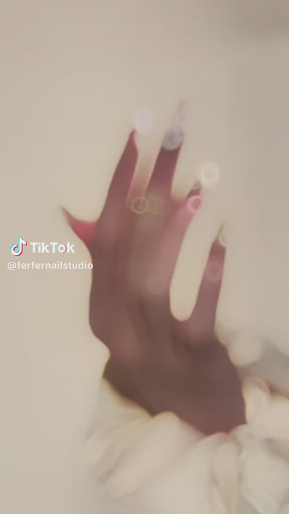 Video: Seashell Blossom Press-On Nails – Nude Base with 3D Seashell and Flower Accents, Medium Almond Nails, Showing Application and Wear