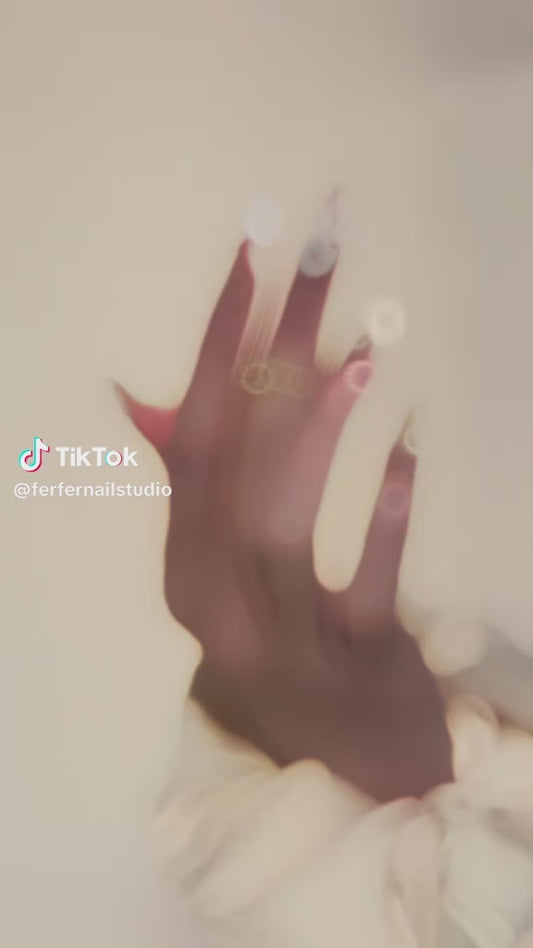 Video: Seashell Blossom Press-On Nails – Nude Base with 3D Seashell and Flower Accents, Medium Almond Nails, Showing Application and Wear