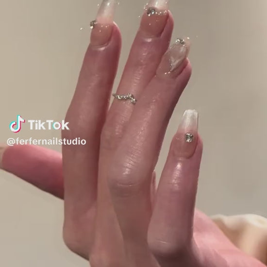 Video: Mermaid Tales Press-On Nails – Nude Cat Eye with 3D Mermaid Tail Charms and Gems Accents, Medium Coffin Nails, Showing Application and Wear