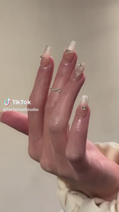 Video: Mermaid Tales Press-On Nails – Nude Cat Eye with 3D Mermaid Tail Charms and Gems Accents, Medium Coffin Nails, Showing Application and Wear