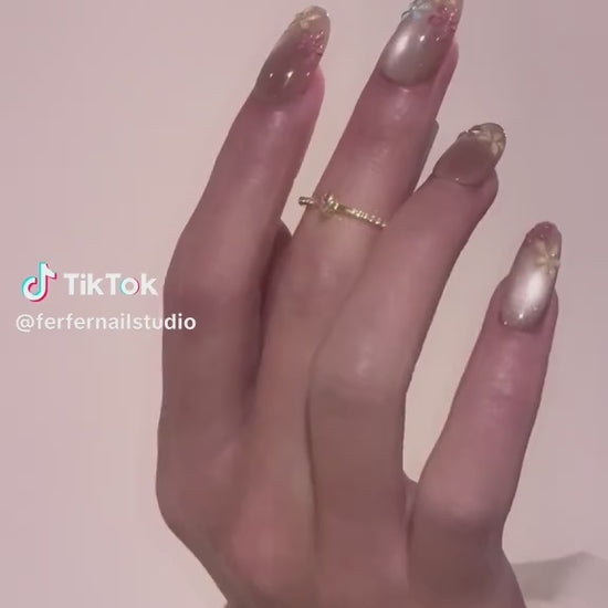 Video: Petal Breeze Press-On Nails – Soft Gradient Cat Eye with 3D Purple Petal Accents, Medium Oval Nails, Showing Application and Wear