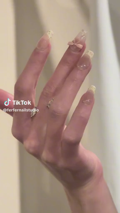 Video: I Do Press-On Nails – Nude French Tip with 3D Pink Bow and Leaf Details, Medium Coffin Nails, Showing Application and Wear